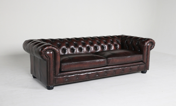Branson Dune Leather Chesterfield Sofa Traditional brown leather chesterfield sofa with nailhead trim.