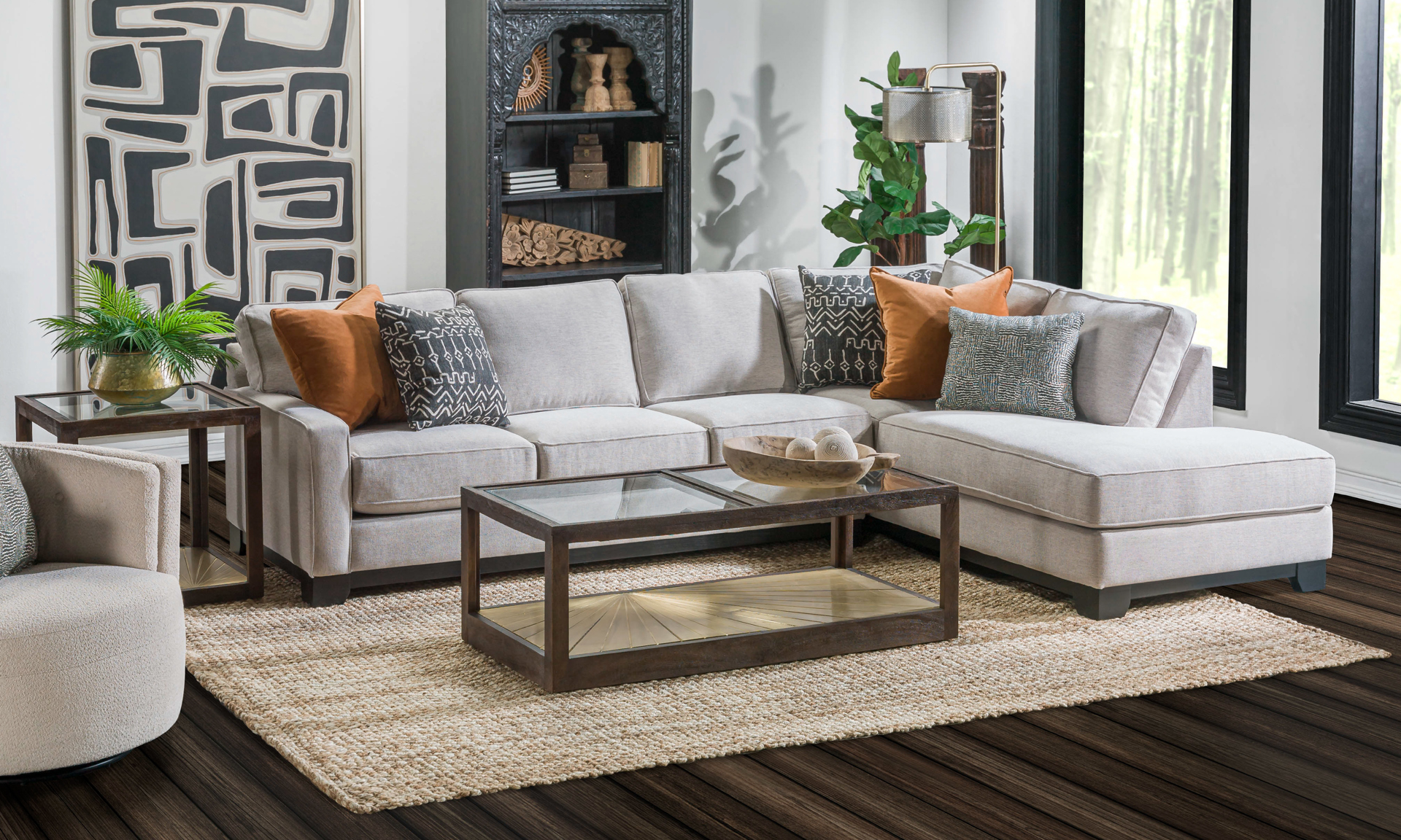 Living Room Neutral grey sectional with accent pillows.